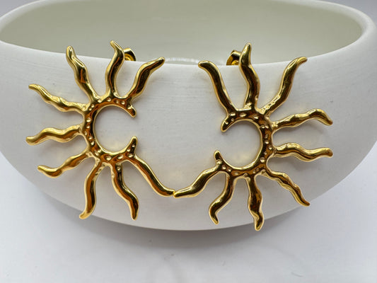 Boucle d’oreille soleil