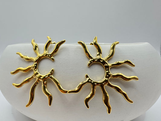 Boucle d’oreille soleil